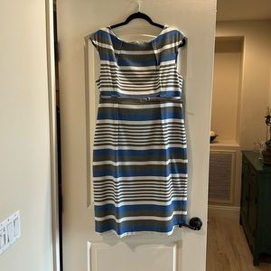 Boat neck sleeveless Calvin Klein dress, silver belt Knee length. front darts.